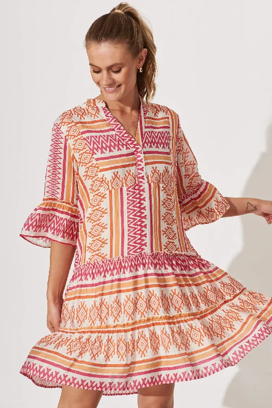 Tesoro Smock Dress In Pink And Orange Aztec Print