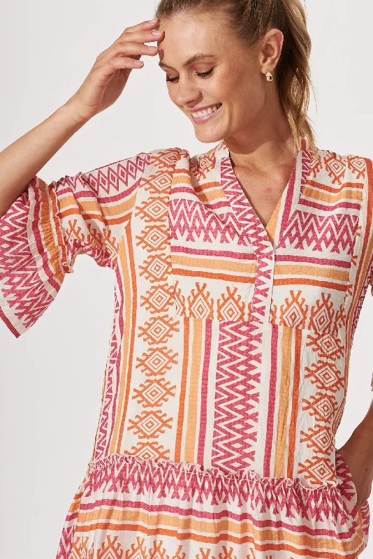 Tesoro Smock Dress In Pink And Orange Aztec Print